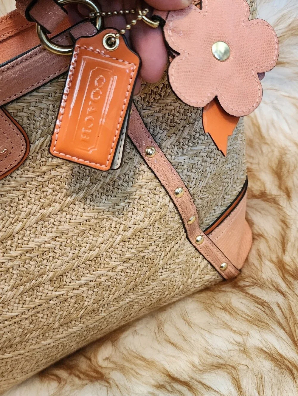 Coach Straw Tote with Pink Leather Trim and Flower Charm
